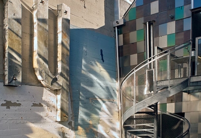 Courtyard and spiral stairs at Shotwell Design Lab in San Francisco.
