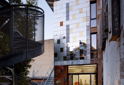 Exterior view of Zero Cottage in San Francisco at dusk.