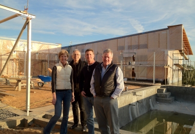 Four people standing in front of Healdsburg Rural House during construction.