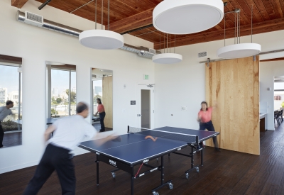 Residents playing table tennis in the wellness room in Lakeside Senior Housing in Oakland, Ca.