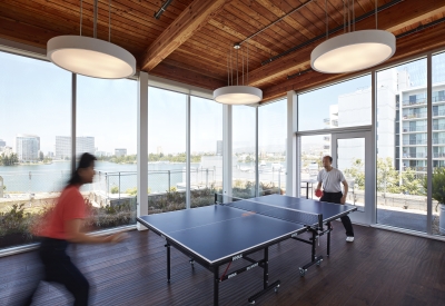 Residents playing table tennis in the wellness room in Lakeside Senior Housing in Oakland, Ca.