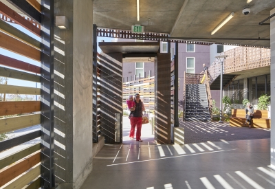 Open-air entrance of Pacific Point Apartments in San Francisco, CA.