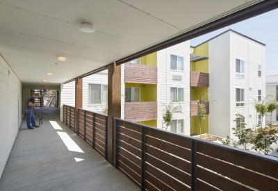 Exterior hallway view of Onizuka Crossing Family Housing in Sunnyvale, California.