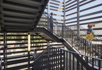 Exterior stairwell view of Onizuka Crossing Family Housing in Sunnyvale, California.