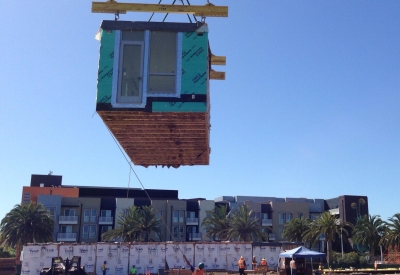 Modular placement during construction of Union Flats in Union City, Ca.