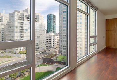 Unit inside Rincon Green with large windows looking out to a view of San Francisco.
