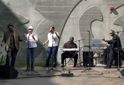 Five-person band preforming at Armstrong Place Senior in San Francisco.