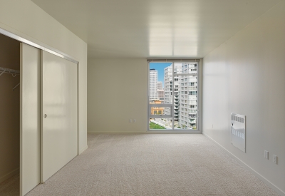 Bedroom inside a unit at Rincon Green in San Francisco.