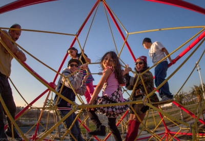 Children playing on the playground at Station Center Family Housing in Union City, Ca