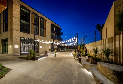 Pedestrian greenway at dusk at Mason on Mariposa in San Francisco.