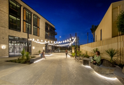 Pedestrian greenway at dusk at Mason on Mariposa in San Francisco.