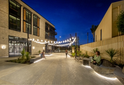 Pedestrian greenway at dusk at Mason on Mariposa in San Francisco.