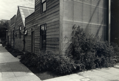 Black and white exterior corner street view of Spaghetti House in Berkeley, California.