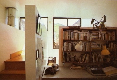 Study to the left of the stairs inside Spaghetti House in Berkeley, California.