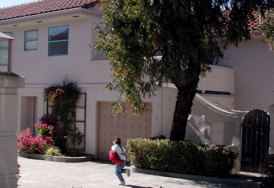 Child running down the pedestrian mew at Holloway Terrace in San Francisco.