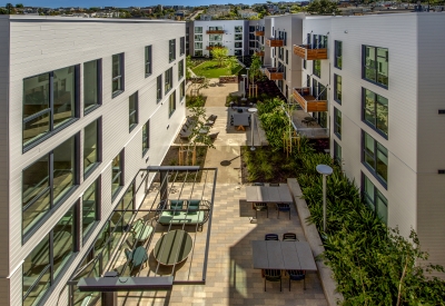 View of residential patio and green space at Mason on Mariposa in San Francisco.