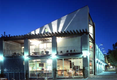 Exterior view of Bison Building & Brew Pub at night in Berkeley, California.