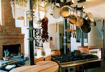 Interior kitchen and living room at Revenge of the Stuccoids in Berkeley, California.