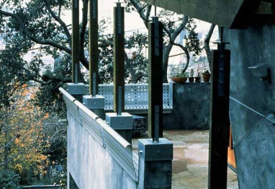 Exterior view of the outdoor porch at Revenge of the Stuccoids in Berkeley, California.