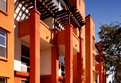 Sidewalk view of ground-level units at Plaza Maria in San Jose, California.