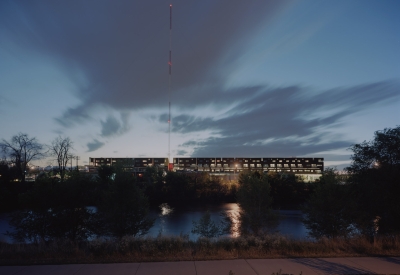 River with Taxi 2 in the background at night  in Denver, Colorado. 