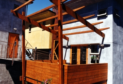 Exterior view of the wood balcony at Kayo House in Oakland, California.