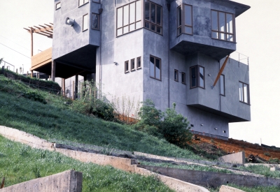 Exterior view of Kayo House from below the hill in Oakland, California.