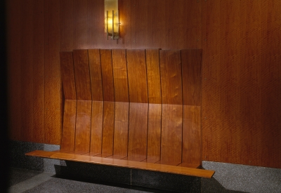 Wood plank bench inside the Marquee Lofts in San Francisco.