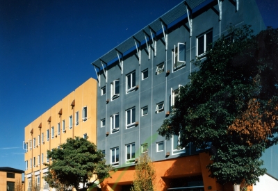 Exterior view of the retail spaces at Manville Hall in Berkeley, California.