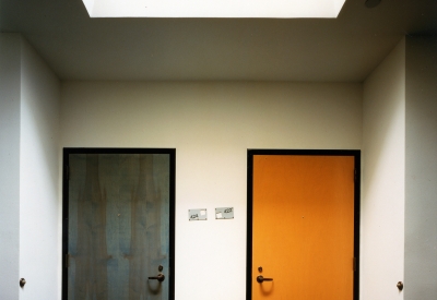 Two unit doors next to each other at Manville Hall in Berkeley, California.