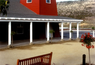 Courtyard with benches in front of the community building Moonridge Village in Santa Cruz, California.