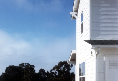 Exterior view of a townhouse from the side at Moonridge Village in Santa Cruz, California.