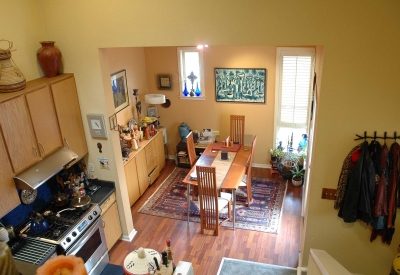 Interior view of a unit dining room and kitchen at Bell Mews in San Francisco. 