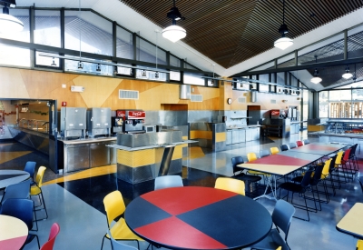 Interior view of U.C. Berkeley Dining Halls with an abundance of seating.