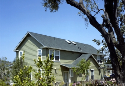 Townhouse beyond the community rose garden at Oroysom Village in Fremont, California.