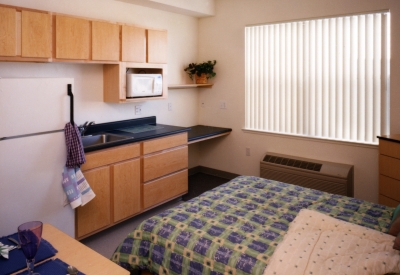 Interior view of a studio unit at Pensione Esperanza in San Jose, California.