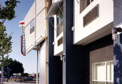 Exterior view of the entry sign to Pensione Esperanza in San Jose, California.