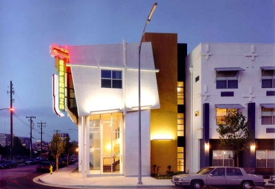 Exterior view of Pensione Esperanza at sunset in San Jose, California.