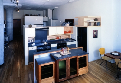 Interior view of a loft unit kitchen at 1500 Park Avenue Lofts in Emeryville, California.