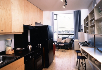 Interior view of a unit kitchen at 1500 Park Avenue Lofts in Emeryville, California.