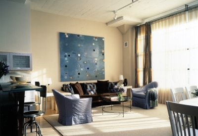 Interior view of a unit living room at 1500 Park Avenue Lofts in Emeryville, California.
