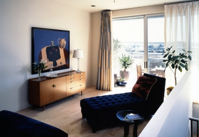 Interior view of a unit duplex loft living room at 1500 Park Avenue Lofts in Emeryville, California.