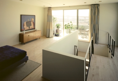 Interior view of an upstairs loft unit at 1500 Park Avenue Lofts in Emeryville, California.