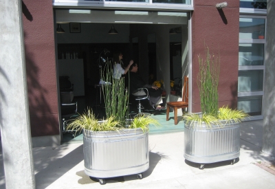 Exterior view of a flex loft with a hair salon inside at 1500 Park Avenue Lofts in Emeryville, California.