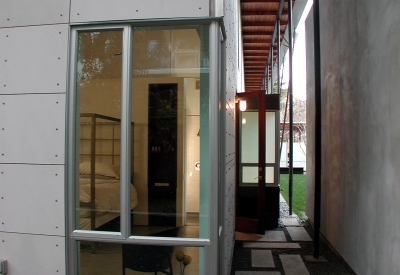 Looking through the window into the master bedroom at 310 Waverly Residence in Palo Alto, California.