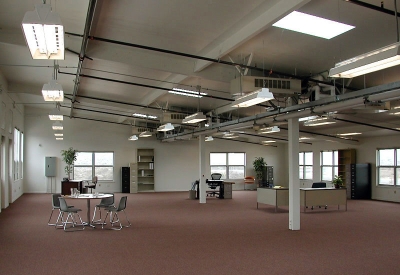 Interior view of a large space inside UCMBEST in Marina, California.