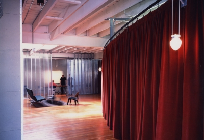 View of the second floor conference room with conversation chairs at Frogdesign Studio in San Francisco. 