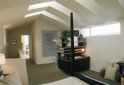 Bedroom inside a townhouse unit at Iron Horse Lofts in Walnut Creek, California.