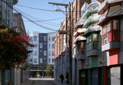 View from an alley with 8th & Howard/SOMA Studios in San Francisco, Ca in the background.
