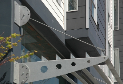 Awning detail above retail spaces at 8th & Howard/SOMA Studios in San Francisco, Ca.